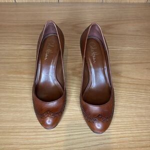 Cole Haan heels.  Brown leather with Nike air technology.  Size 7B.